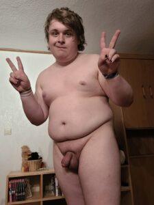 Sissy Lucas standing proudly naked in front of the camera